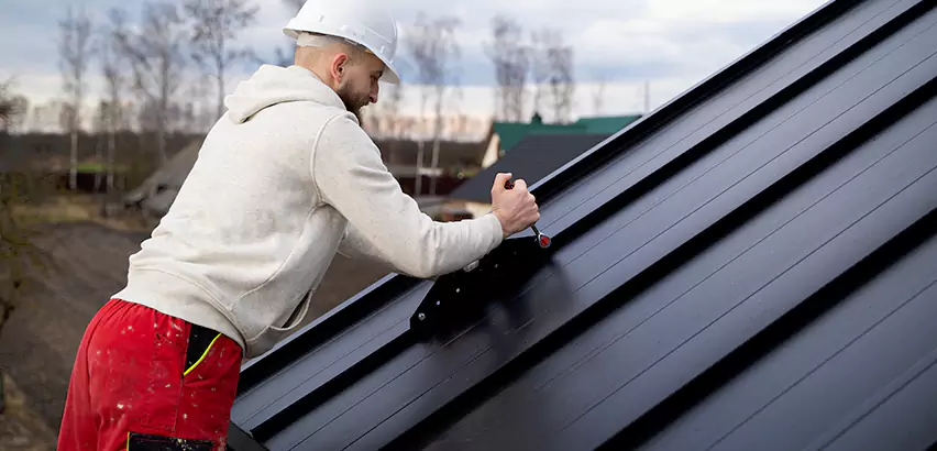 Tin Roof Ridge Cap Installation in Niles